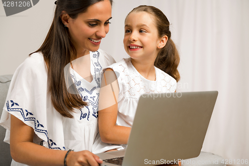 Image of Mother and Daughter at home