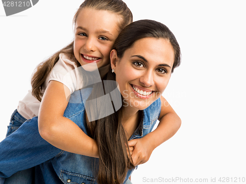 Image of Piggyback ride with mum