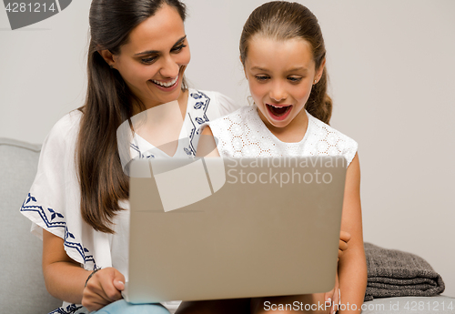 Image of Mother and Daughter at home