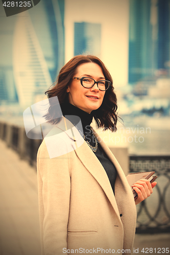 Image of fashion style. portrait of a beautiful businesswoman in a light 