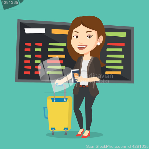 Image of Woman with suitcase and ticket at the airport.