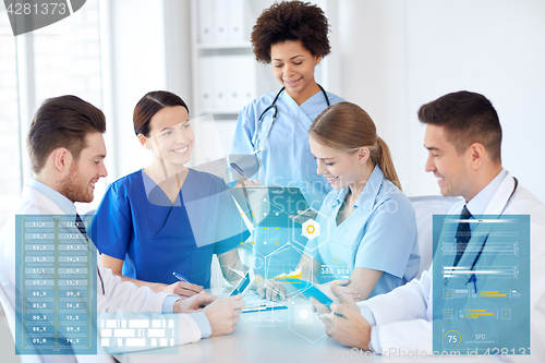 Image of group of happy doctors meeting at hospital office