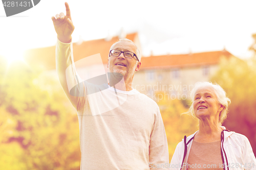 Image of senior couple in city park