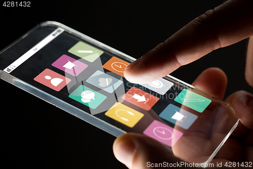 Image of close up of businessman hand with glass smartphone