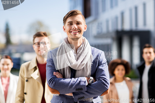 Image of international group of people on city street