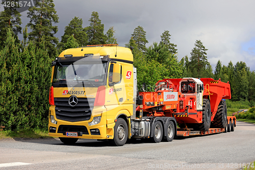 Image of Mercedes-Benz Semi Hauls Mining Vehicle