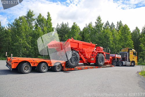 Image of Silvasti Truck Hauls Sandvik Mining Vehicle Rear View