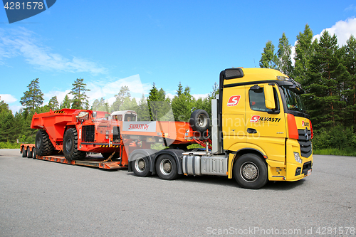 Image of Mercedes-Benz Actros Hauls Sandvik Mining Vehicle