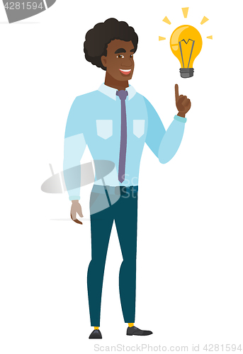 Image of Businessman pointing at business idea light bulb.