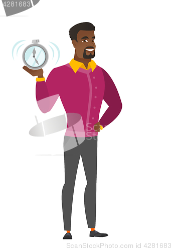 Image of African-american business man holding alarm clock.
