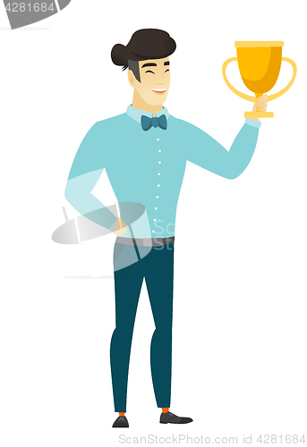 Image of Asian business man holding a trophy.