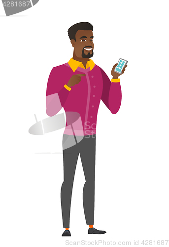 Image of African business man holding a mobile phone.