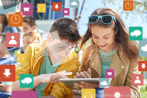 Image of group of students with tablet pc outdoors