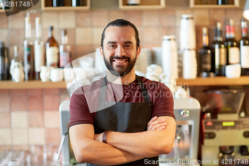 Image of happy man, barman or waiter at bar