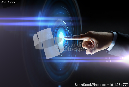 Image of male hand pointing finger to virtual projection