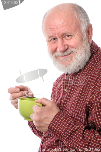 Image of Cheerfull senior man with green cup, isolated on white