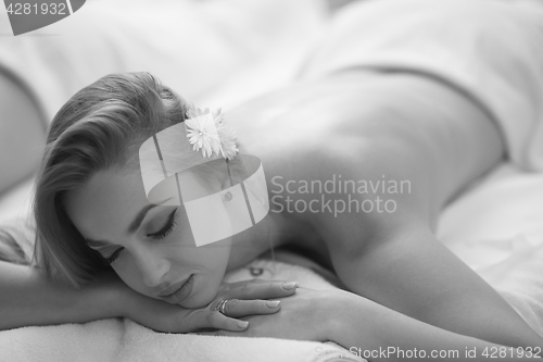 Image of woman laying on massage table