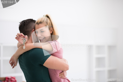 Image of happy Young couple moving in new house