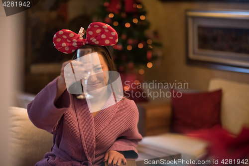 Image of woman drinking champagne at spa