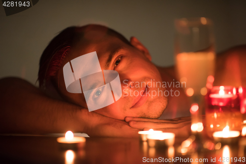 Image of man relaxing in the jacuzzi