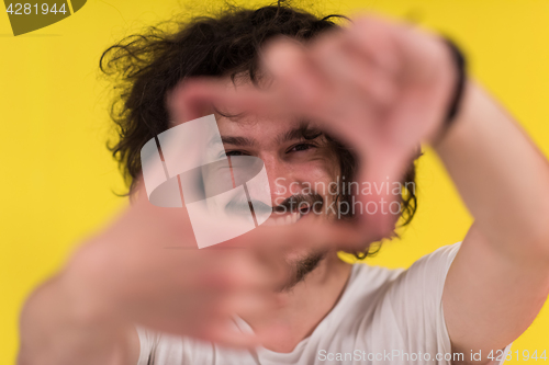 Image of young man with funny hair over color background