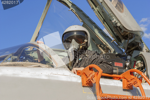 Image of Military pilot in the cockpit of a jet aircraft