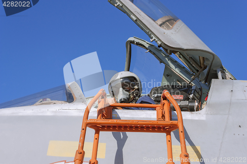 Image of Military pilot in the cockpit of a jet aircraft