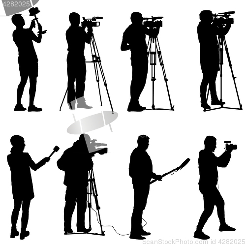 Image of Set cameraman with video camera. Silhouettes on white background