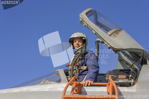 Image of Military pilot in the cockpit of a jet aircraft