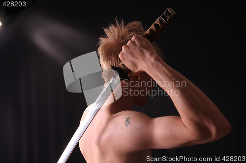 Image of Man holding samurai sword