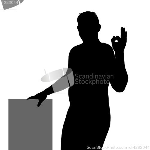 Image of Black silhouette of a man showing hand sign OK