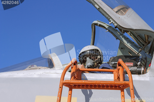 Image of Military pilot in the cockpit of a jet aircraft