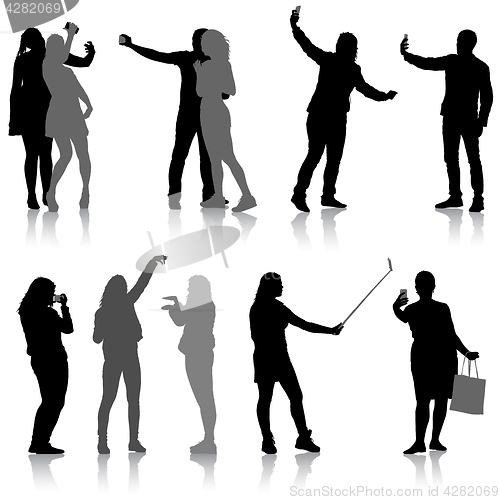 Image of Set silhouettes man and woman taking selfie with smartphone on white background. illustration