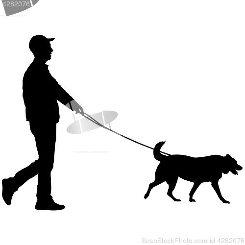 Image of Silhouette of man and dog on a white background