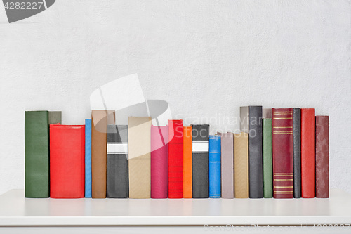 Image of stack of books on the table