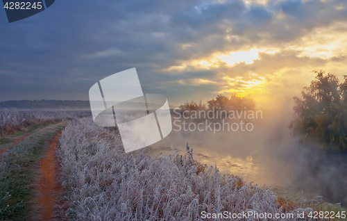 Image of Foggy Sunrise Over The River