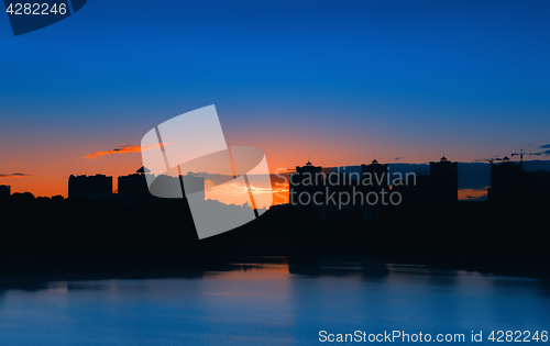 Image of Night City Landscape With Lake