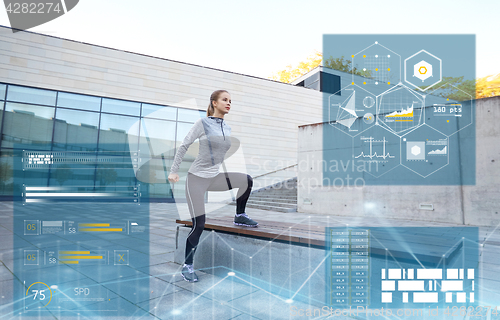 Image of woman exercising on bench outdoors