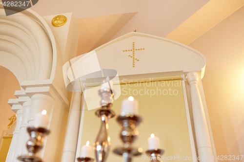 Image of candles burning in orthodox church