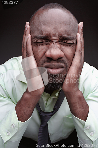 Image of Scared black man face.