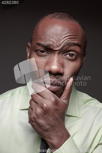 Image of portrait of handsome young black african man