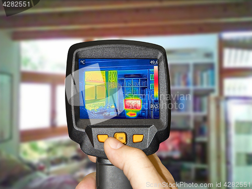 Image of Recording heated TV and a window in the living room, with therma