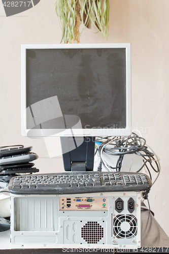 Image of old computer and accessories for electronic recycling