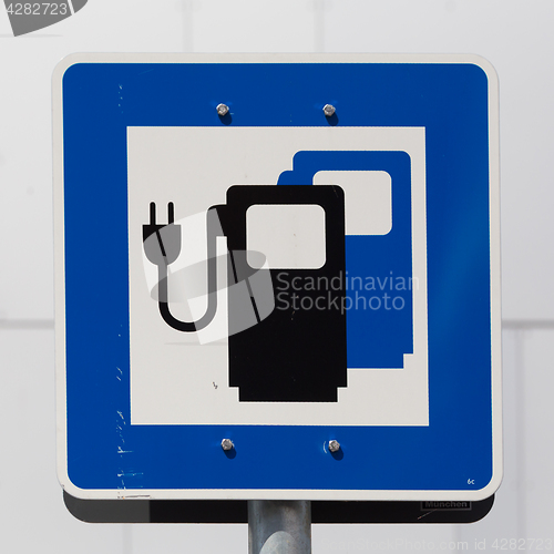 Image of Electric car charging station road sign.