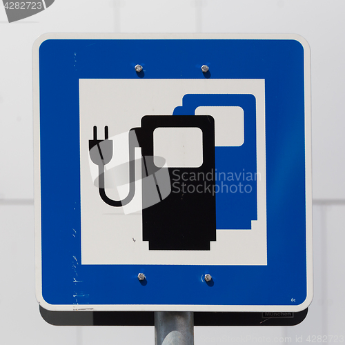 Image of Electric car charging station road sign.