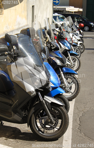 Image of Scooters in line
