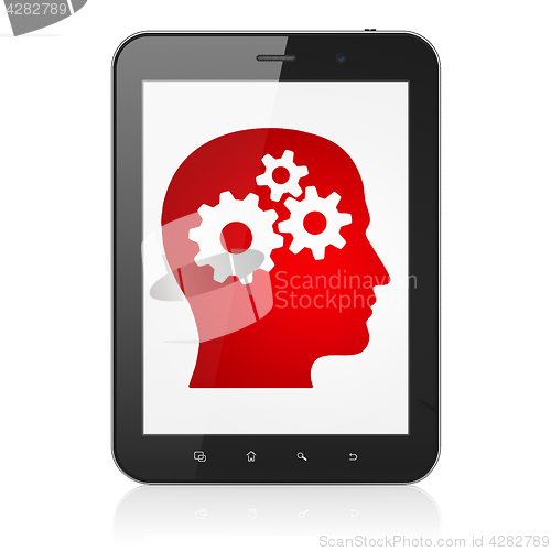 Image of Data concept: Tablet Computer with Head With Gears on display