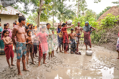 Image of Barefoot in mud in Bangladesh