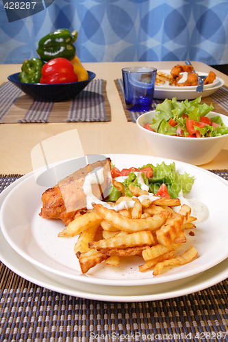 Image of French fries and chicken