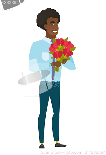 Image of Caucasian businessman holding a bouquet of flowers